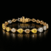 Pink, yellow, and white pear diamond vintage bracelet, luxury jewelry from Reeva Rare CVD diamond pink yellow bracelet elegant gold design