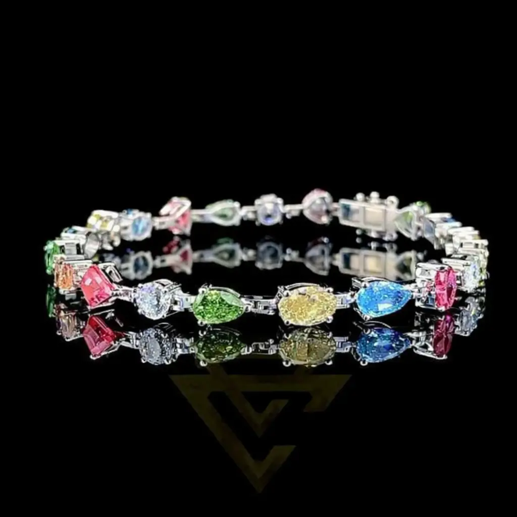Color diamond bracelet with multi colored diamonds set in fine gold bracelet
